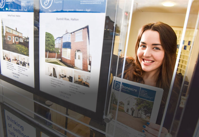 Agent in office window